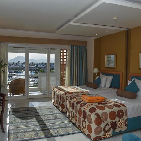 Pickalbatros Golf Beach Resort Sharm el-Sheikh Ngoại thất bức ảnh A room at the Hilton Sharm El Sheikh